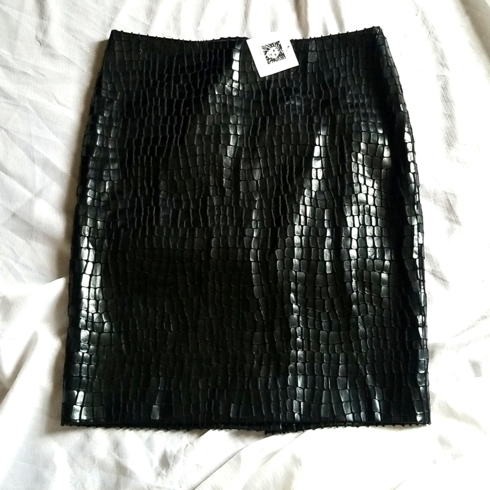 Anne Klein pencil skirts.